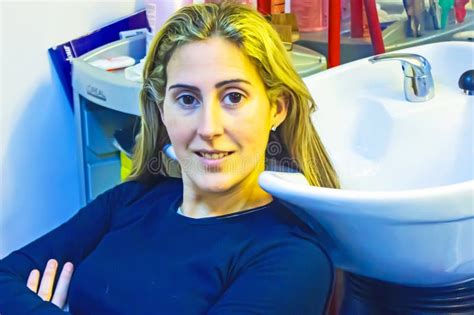 Blonde Woman With Long Hair Waits For Hair Washing Stock Image Image
