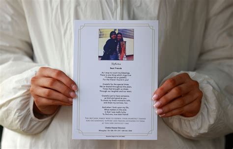 Tears flow as mourners told 'hands of the two girls touching as though