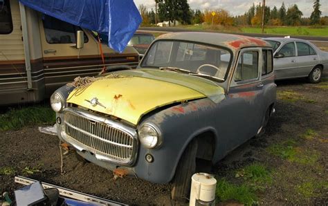 OLD PARKED CARS.: 1954 Hillman Husky.