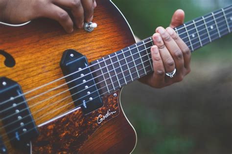 person playing guitar royalty  stock photo