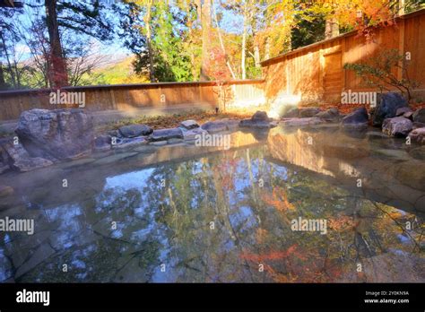 Open Air Hot Spring Bath Reflecting Colored Leaves On It Stock Photo Alamy
