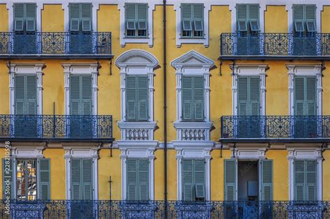 Typical french architecture in Nice, France. Frontal symmetrical facade ...