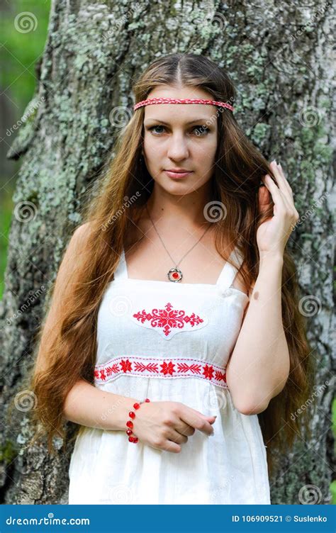 Portrait Of A Young Beautiful Slavic Girl With Long Hair And Slavic