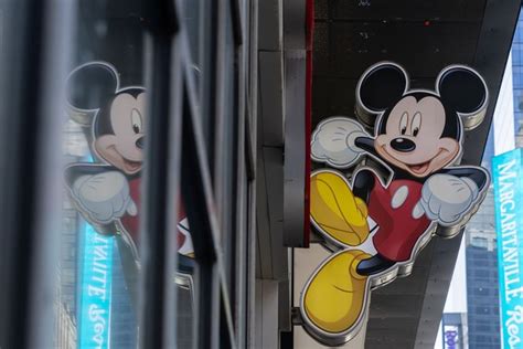 walt disney stock slips  company defeats activist investor
