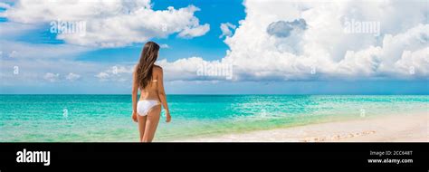 Beach Vacation Travel Luxury Bikini Woman Relaxing On Summer Holidays With Copy Space Ocean Sky