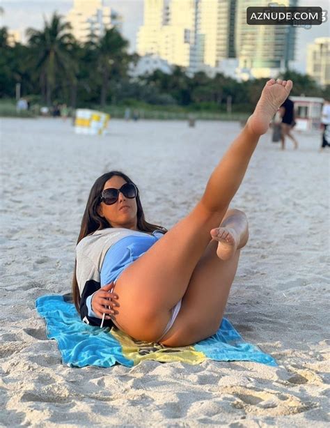 Claudia Romani Sexy Photos Showing Off Her Hot Legs At The Beach AZNude