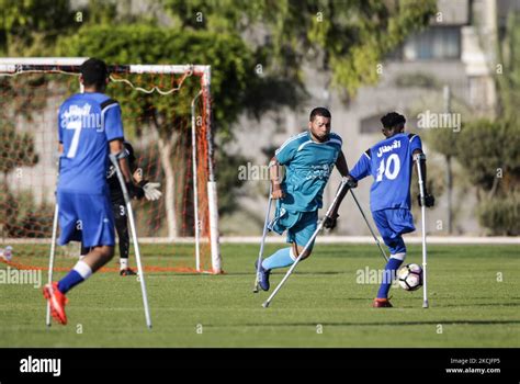 Palestinian amputee soccer players take part in a league match for ...