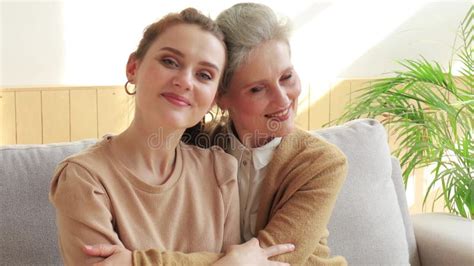 Happy Loving Mature Mother Embracing Her Daughter Talking Enjoy Moments