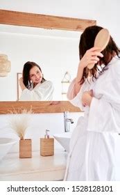 Photo Brunette Combing Her Hair Front Stock Photo Shutterstock