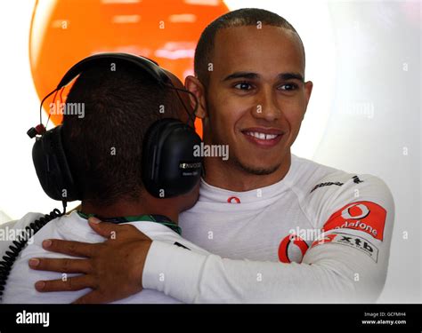 Lewis Hamilton Hugs His Brother Nick At The Catalunya Circuit Hi Res