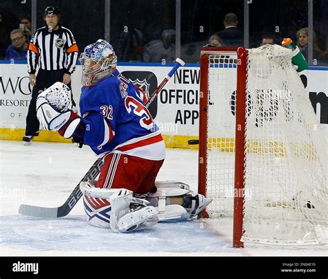 New York Rangers Goalie Antti Raanta Watches As The Puck Shot By Los