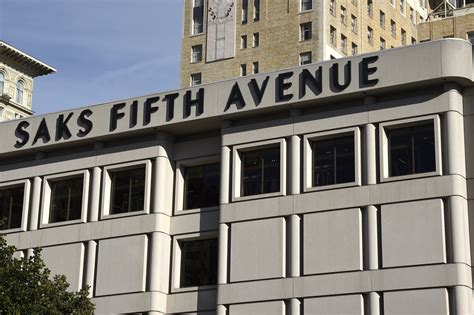 saks  avenue owner  split sakscom  separate business