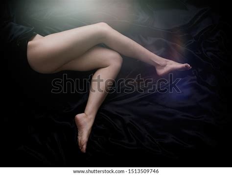 Nude Woman Legs On Black Background Stock Photo Shutterstock