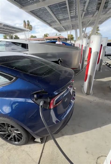 New Tesla Model Gets Dwarfed By The Cybertruck While Resting At A