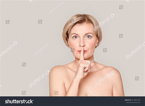 Naked Mature Blonde Woman Standing Isolated Stock Photo Edit Now 1717821136