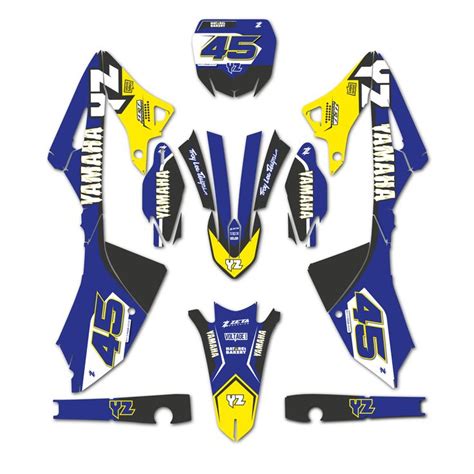 Blue And Yellow Dirt Bike Graphics With Numbers On The Front Back And