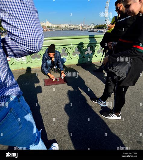 The Shell Game Three Cups Trick Illegal Scam On Westminster Bridge