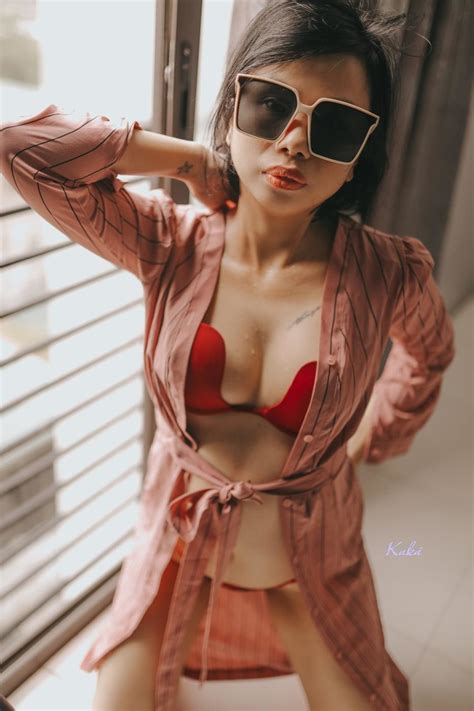 Brunette Asian Model Posing In Her Super Sexy Outfit In An Erotic Solo NakedPics