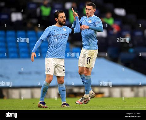 Manchester Citys Phil Foden Right Celebrates Scoring His Sides