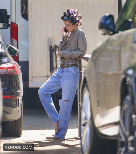 Bella Hadid Sexy And Braless Spotted Flashing Her Hot Cleavage On A Set Of Photoshoot In Beverly