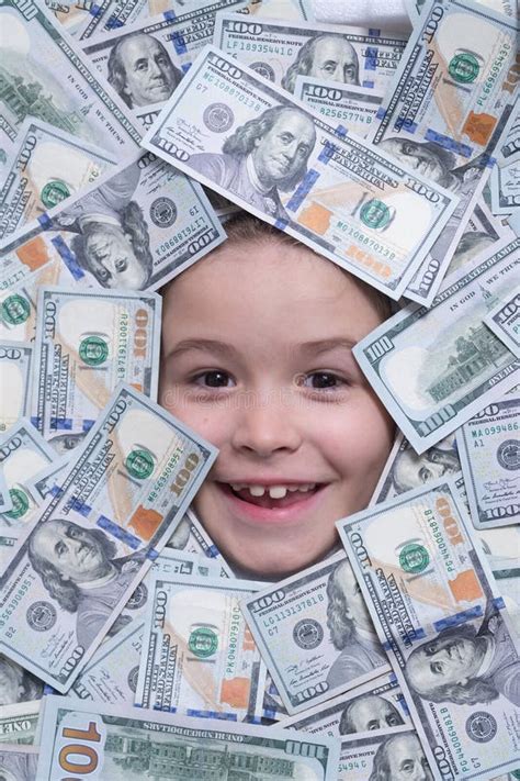 Funny Face In Lot Of Money Fun Kid Face On Dollars Money Stock Image