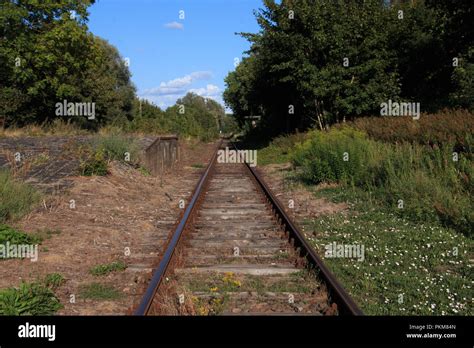 single train track on lost places trainstation Stock Photo - Alamy