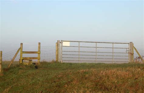 Wooden Stile and Metal Seven Bar Gate Stock Image - Image of footpath, stile: 261904237