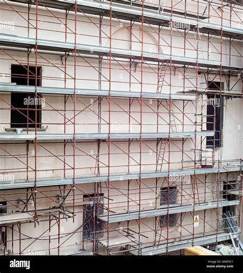 Scaffolding installed on a building under renovation Stock Photo - Alamy 