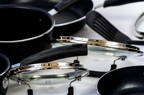 Premium Photo Set Of Aluminum Cookware On Kitchen Counter Metal