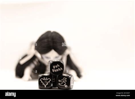 Living Dead Doll And Dices With Symbols Stock Photo Alamy