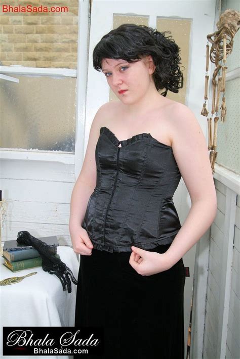 Lovely Brunette Babe Loves Posing In Her Sexy Black Corset Photos