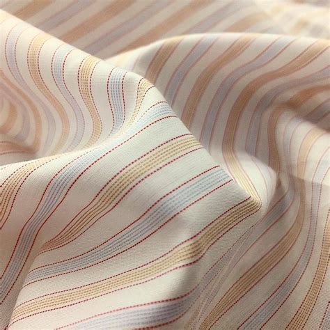 Acorn Fabrics Ltd — This delicate, intricate fabric is another example...