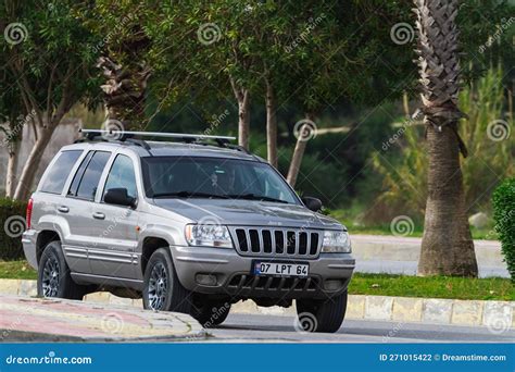 Silver Jeep Grand Cherokee Wk2 Car Moving On The Street Compliance
