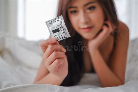 Portrait Asia Woman With Condom Safe Sex Concept Stock Photo Image Of Brassiere Lady