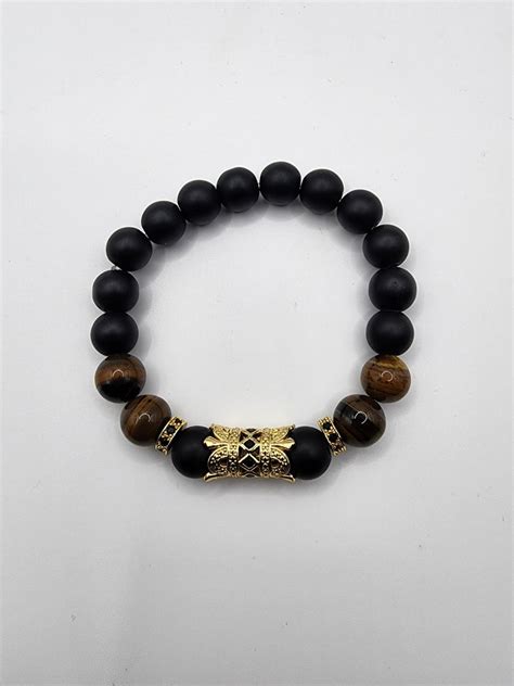 Luxurious Black Onyx Tiger S Eye Bracelet With Gold Mask Charm Ideal