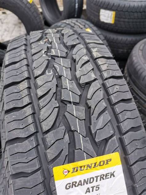 Всесезонные шины Dunlop Grandtrek AT5 235/60 R16 купить в Гомеле ...