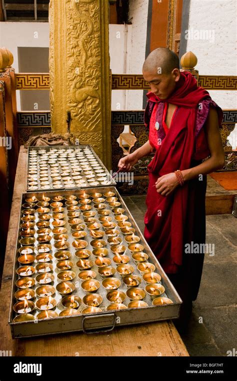 Bhutan Monk Lighting Candles Hi Res Stock Photography And Images Alamy