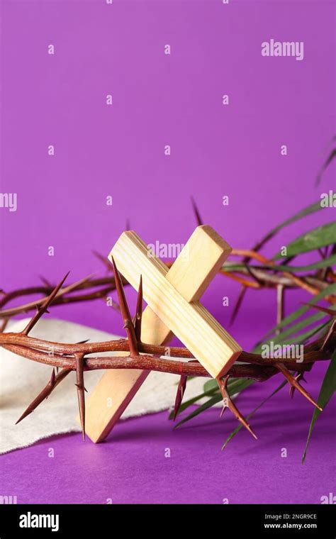 Crown Of Thorns With Wooden Cross And Shroud On Violet Background