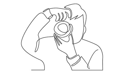 Premium Vector Continuous Line Of Man Holding Digital Camera Illustration