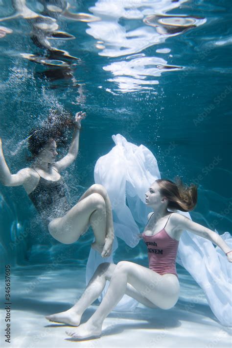 Two Beautiful Lesbian Girls Are Swimming Underwater Attractiveness Sexual Poses And Gestures