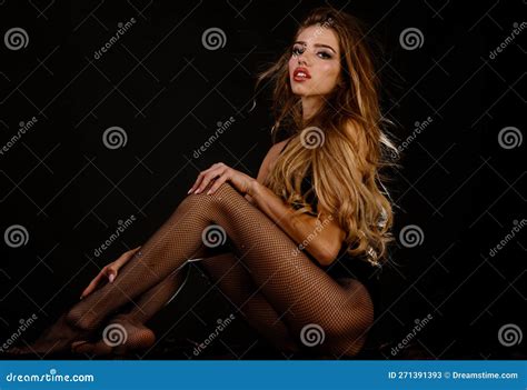 Seductive Woman With Luxury Makeup And Long Blonde Curly Hair Posing At Camera Hot Girl With