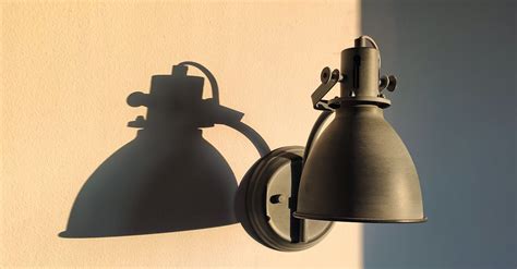 Lamp Shadow On Sunlit Wall · Free Stock Photo