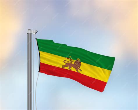 Premium Photo | Waving rastafarian flag on a flag pole