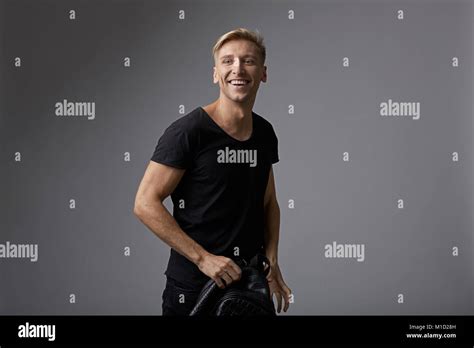 Portrait Happy Young Man With Shiny Smile Stock Photo Alamy