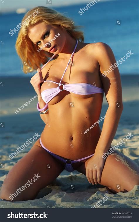 Sexy Blonde Woman Posing Purple Bikini Stock Photo Shutterstock