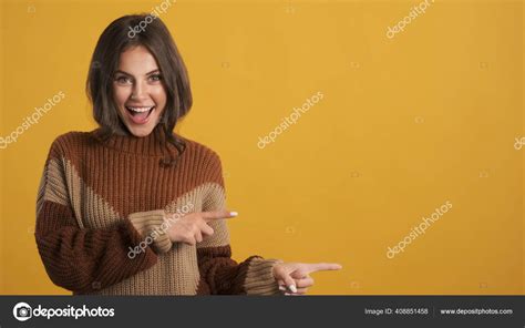 Cheerful Brunette Girl Cozy Knitted Sweater Happily Showing Index Fingers Stock Photo