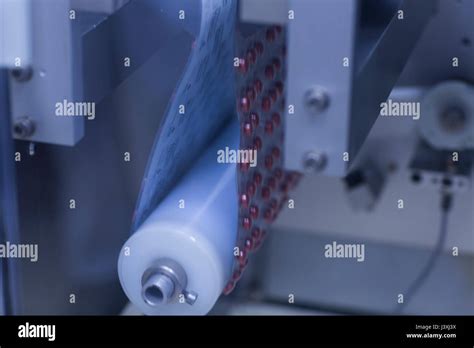 tablet strip packing machine  pharmaceutical plant stock photo alamy