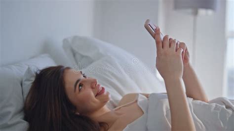 Happy Woman Texting Bed At Morning Closeup Joyful Brunette Lying On Bedding Stock Footage