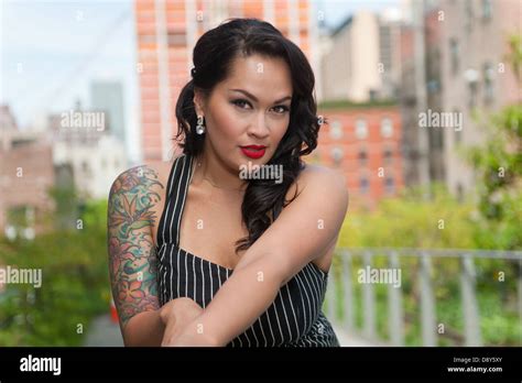 Tattooed Brunette Hi Res Stock Photography And Images Alamy