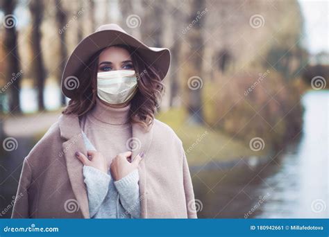 Woman In Medical Face Mask Walking In Park Stock Image Image Of